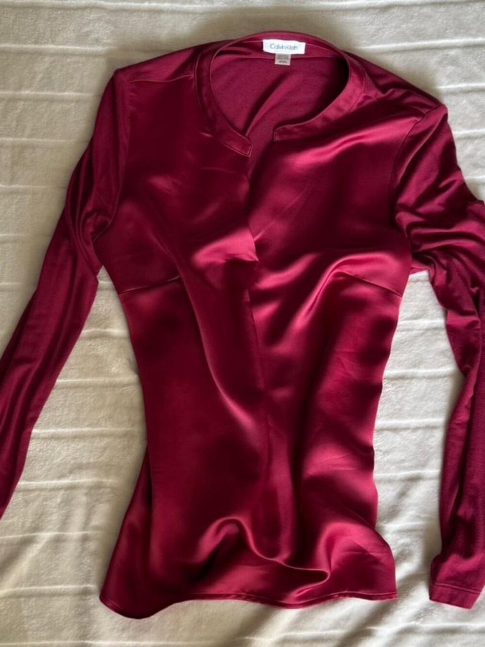 A beautiful cranberry/red Calvin Klein shirt/blouse